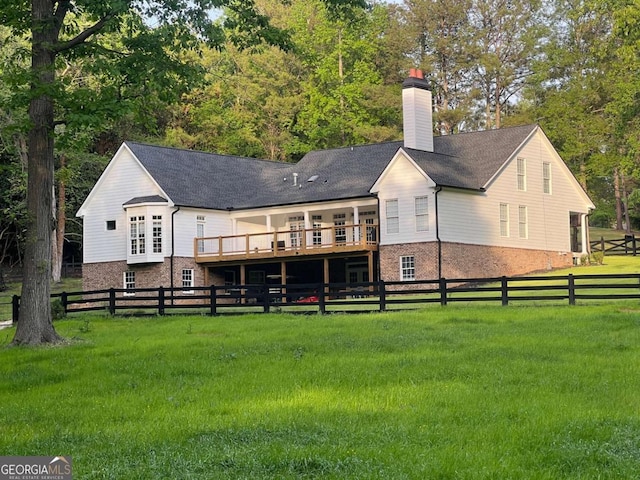 128 Golden Hills Dr, Woodstock, GA 30189 - back of property featuring a wooden deck, a chimney, and brick siding