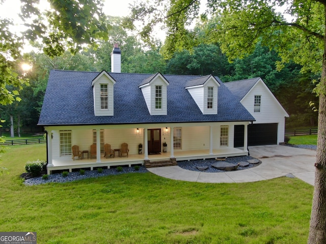 128 Golden Hills Dr, Woodstock, GA 30189 - back of property with covered porch, a garage, driveway, and a shingled roof
