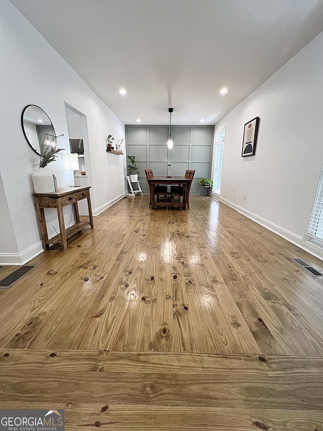 128 Golden Hills Dr, Woodstock, GA 30189 - dining area with wood finished floors, baseboards, and recessed lighting