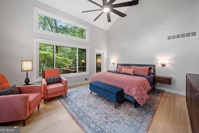 545 Matterhorn Way, Alpharetta, GA 30022 - bedroom featuring high vaulted ceiling, light wood-type flooring, baseboards, and ceiling fan