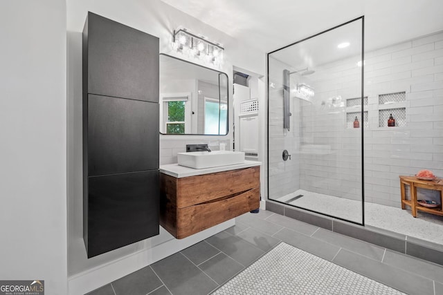 545 Matterhorn Way, Alpharetta, GA 30022 - full bathroom featuring tiled shower, vanity, and tile patterned flooring