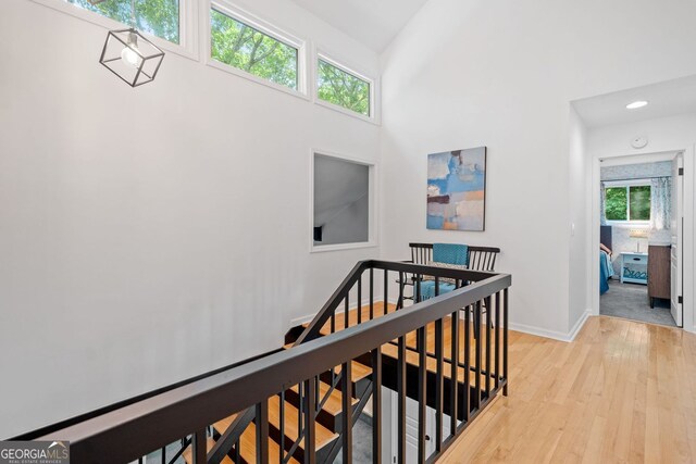 545 Matterhorn Way, Alpharetta, GA 30022 - hallway featuring an upstairs landing, light wood-style floors, and recessed lighting