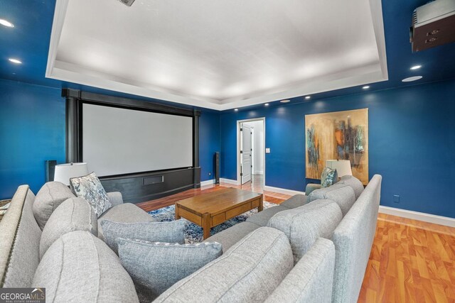 545 Matterhorn Way, Alpharetta, GA 30022 - home theater featuring a raised ceiling, baseboards, light wood-type flooring, and recessed lighting