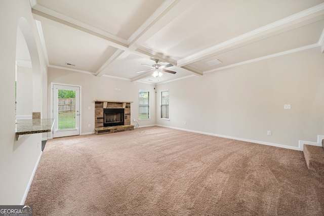 212 Jetta Cir, Mcdonough, GA 30253 - unfurnished living room with coffered ceiling, plenty of natural light, carpet floors, ceiling fan, and beam ceiling