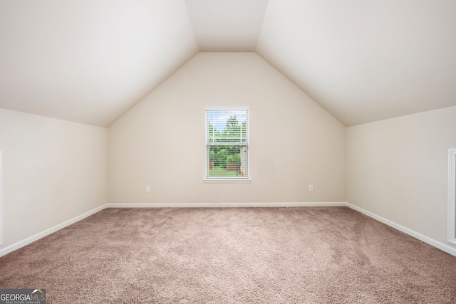 212 Jetta Cir, Mcdonough, GA 30253 - additional living space with carpet and vaulted ceiling