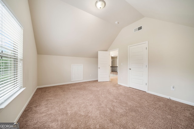 212 Jetta Cir, Mcdonough, GA 30253 - bonus room featuring vaulted ceiling and light colored carpet
