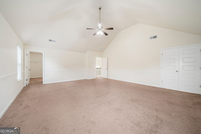 212 Jetta Cir, Mcdonough, GA 30253 - carpeted spare room with vaulted ceiling and a ceiling fan
