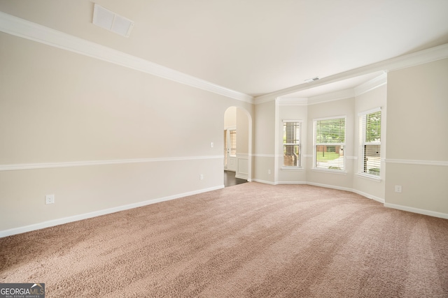 212 Jetta Cir, Mcdonough, GA 30253 - carpeted spare room with ornamental molding and arched walkways