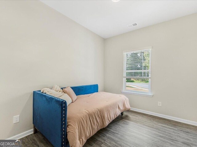 340 Louise Ln, Canton, GA 30114 - bedroom featuring baseboards and wood finished floors