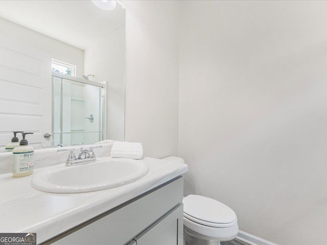 340 Louise Ln, Canton, GA 30114 - bathroom with a shower stall, vanity, and toilet