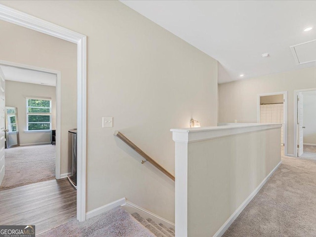 340 Louise Ln, Canton, GA 30114 - corridor with an upstairs landing, attic access, carpet flooring, and baseboards