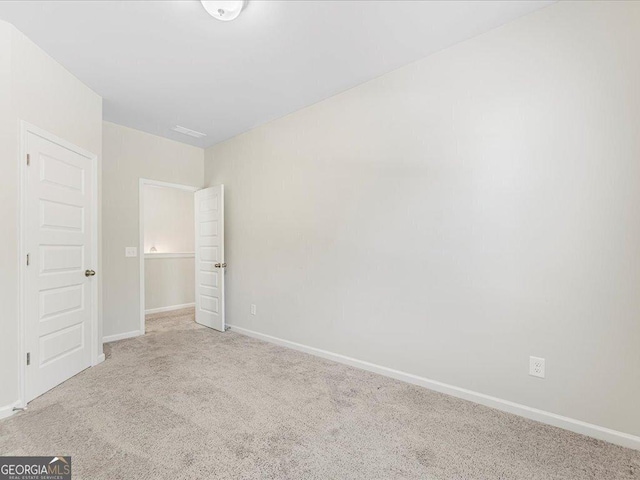 340 Louise Ln, Canton, GA 30114 - unfurnished bedroom featuring carpet and baseboards
