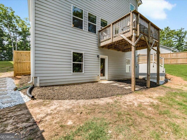 340 Louise Ln, Canton, GA 30114 - rear view of property with a wooden deck