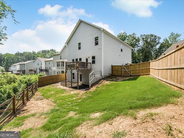 340 Louise Ln, Canton, GA 30114 - rear view of house with a wooden deck and stairs