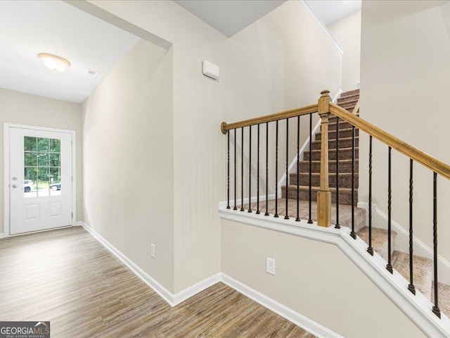 340 Louise Ln, Canton, GA 30114 - staircase with wood finished floors and baseboards