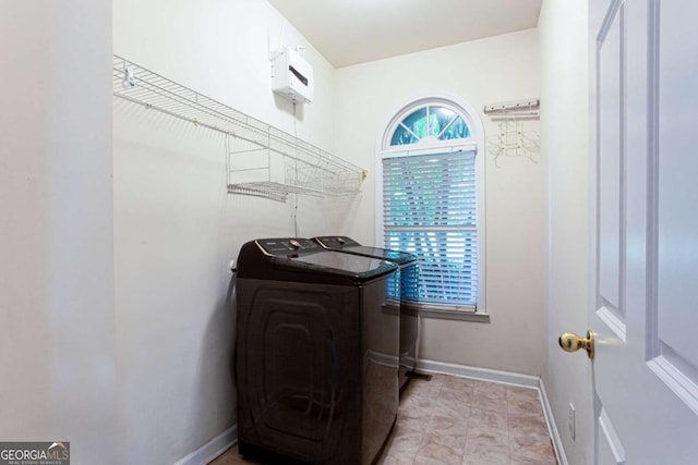 4045 Hillcrest View Ct, Suwanee, GA 30024 - laundry area with washer and clothes dryer and baseboards