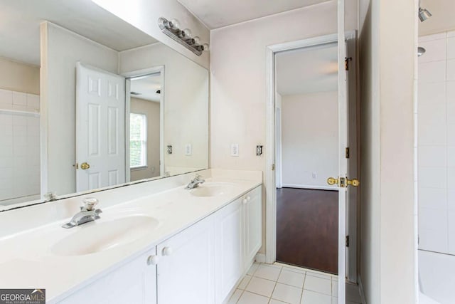 4045 Hillcrest View Ct, Suwanee, GA 30024 - bathroom with double vanity, tile patterned flooring, and a shower