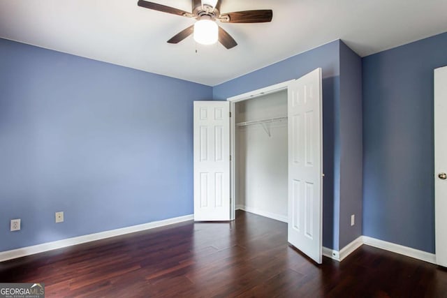 4045 Hillcrest View Ct, Suwanee, GA 30024 - unfurnished bedroom with wood finished floors, baseboards, ceiling fan, and a closet