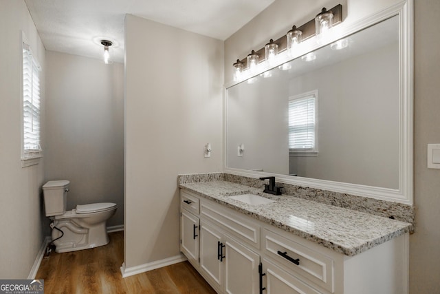 870 Rutherford Dr, Dacula, GA 30019 - bathroom featuring vanity and wood finished floors