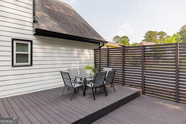 870 Rutherford Dr, Dacula, GA 30019 - wooden deck featuring outdoor dining area
