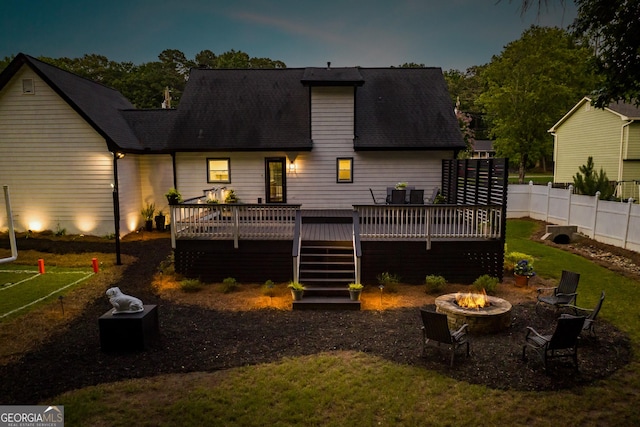 870 Rutherford Dr, Dacula, GA 30019 - rear view of property with a fire pit, a wooden deck, stairs, and roof with shingles
