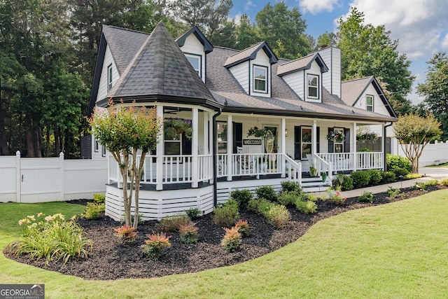 870 Rutherford Dr, Dacula, GA 30019 - view of front of home featuring covered porch, a chimney, and a shingled roof