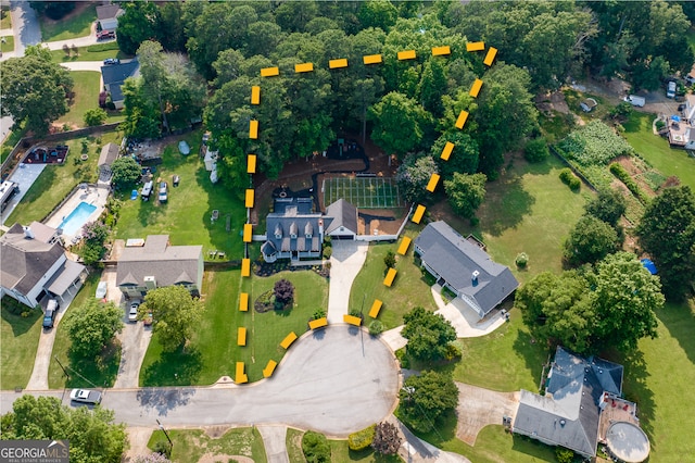 870 Rutherford Dr, Dacula, GA 30019 - aerial view of property and surrounding area featuring property parcel outlined and nearby suburban area