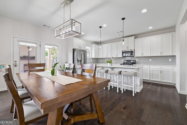 1998 Lakeview Bend Way, Buford, GA 30519 - dining space featuring dark wood finished floors and recessed lighting