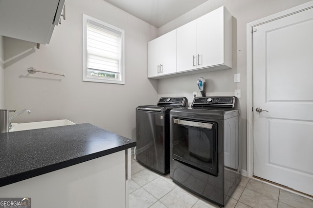1998 Lakeview Bend Way, Buford, GA 30519 - washroom with cabinet space, washing machine and clothes dryer, and light tile patterned floors