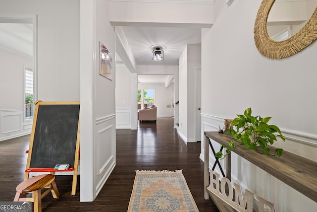 1998 Lakeview Bend Way, Buford, GA 30519 - hallway featuring wood finished floors, a wainscoted wall, and a decorative wall