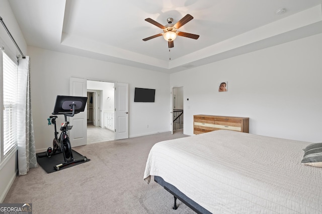 1998 Lakeview Bend Way, Buford, GA 30519 - bedroom with carpet, a tray ceiling, baseboards, and a ceiling fan