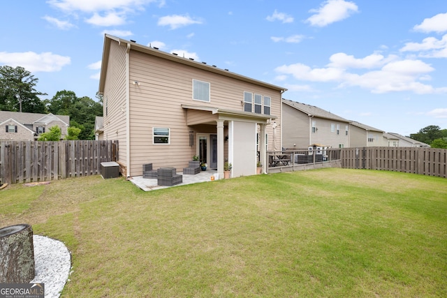 1998 Lakeview Bend Way, Buford, GA 30519 - back of property with a patio area, cooling unit, and an outdoor hangout area