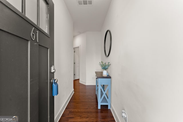 61 N Auburn Landing Pl, Auburn, GA 30011 - hallway featuring dark wood-style floors and baseboards
