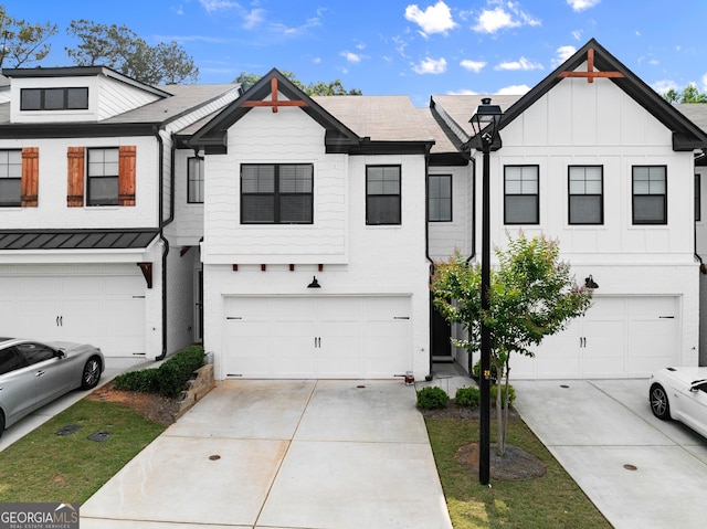 61 N Auburn Landing Pl, Auburn, GA 30011 - multi unit property featuring a garage, board and batten siding, and driveway