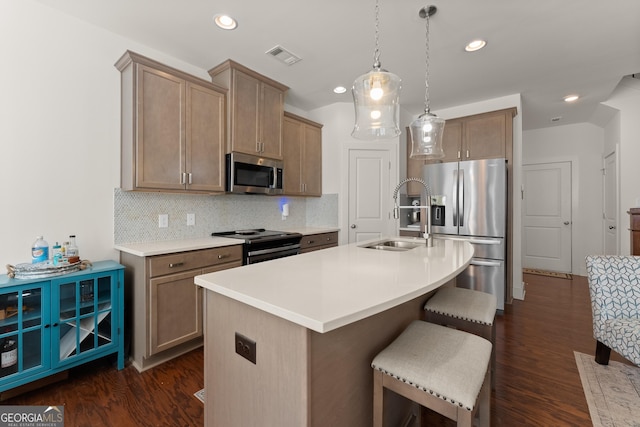 61 N Auburn Landing Pl, Auburn, GA 30011 - kitchen with appliances with stainless steel finishes, a sink, dark wood-type flooring, recessed lighting, and decorative backsplash