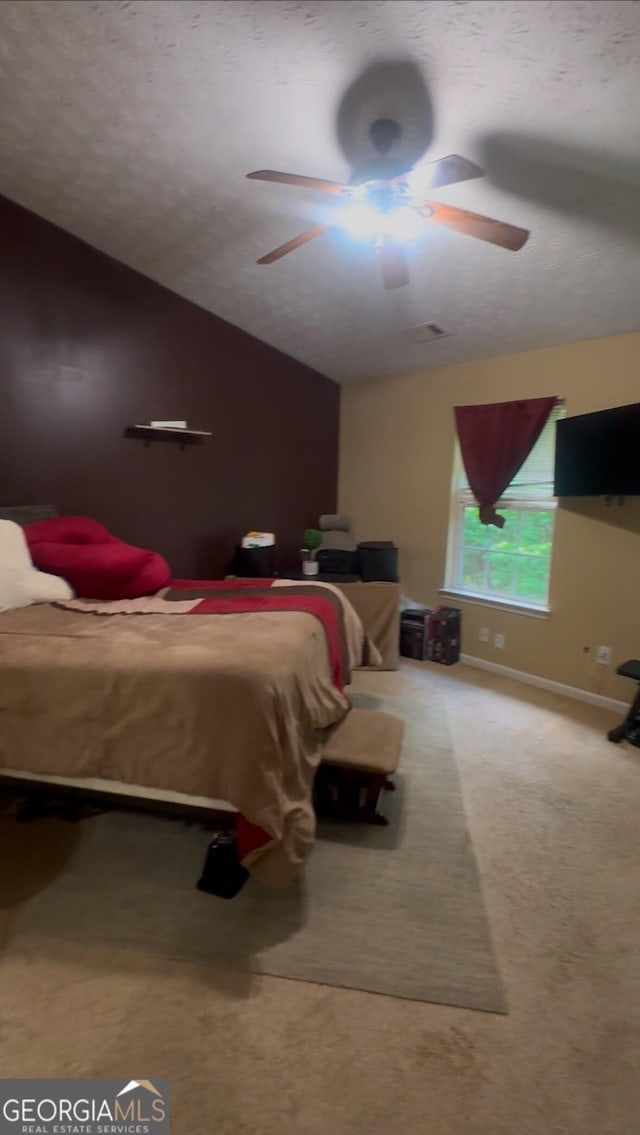 1794 Fielding Way, Hampton, GA 30228 - carpeted bedroom with a ceiling fan and vaulted ceiling