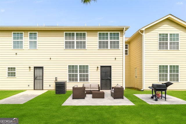 7432 Battlecreek Ln, Jonesboro, GA 30236 - rear view of house with a patio, outdoor lounge area, and a yard