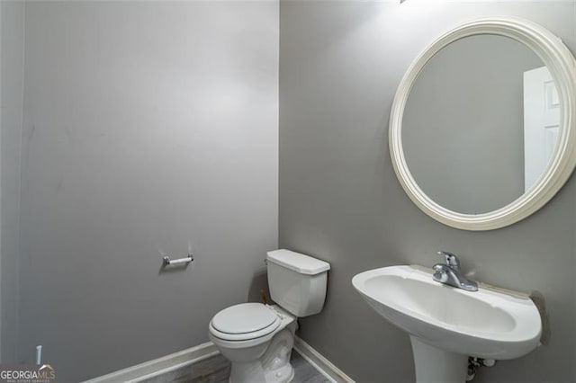 7432 Battlecreek Ln, Jonesboro, GA 30236 - bathroom with toilet and a sink