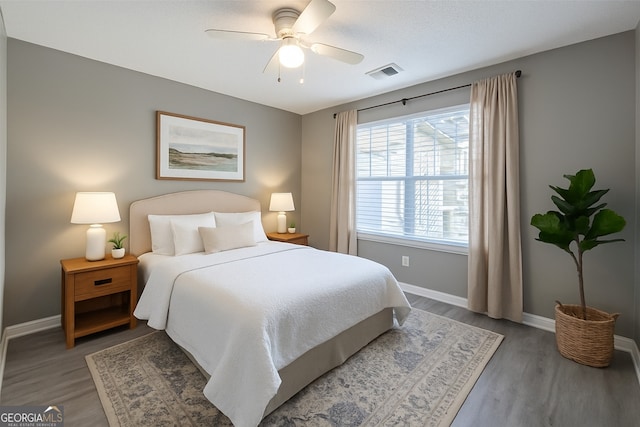 7432 Battlecreek Ln, Jonesboro, GA 30236 - bedroom with wood finished floors and ceiling fan