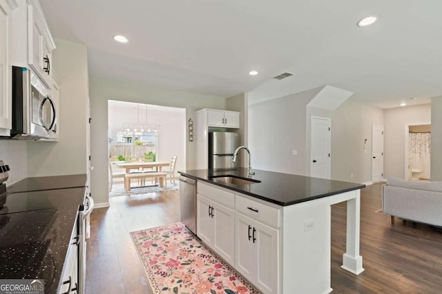 125 Kingston Cir, Carrollton, GA 30117 - kitchen featuring stainless steel appliances, a sink, dark wood-style floors, white cabinets, and recessed lighting