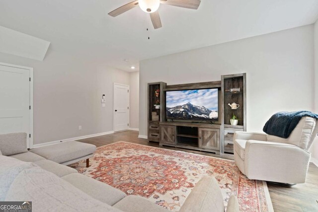 125 Kingston Cir, Carrollton, GA 30117 - living room with wood finished floors, a ceiling fan, baseboards, and recessed lighting