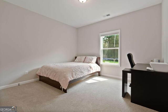 125 Kingston Cir, Carrollton, GA 30117 - bedroom featuring baseboards, carpet, and an office area