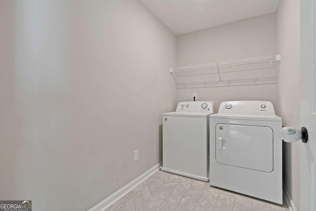 125 Kingston Cir, Carrollton, GA 30117 - washroom featuring washing machine and dryer and baseboards