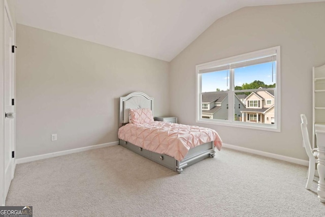 125 Kingston Cir, Carrollton, GA 30117 - bedroom featuring vaulted ceiling, carpet floors, and baseboards
