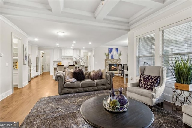 10 Nesbit Reserve Ct, Atlanta, GA 30350 - living area with recessed lighting, a stone fireplace, light wood finished floors, ornamental molding, and beam ceiling