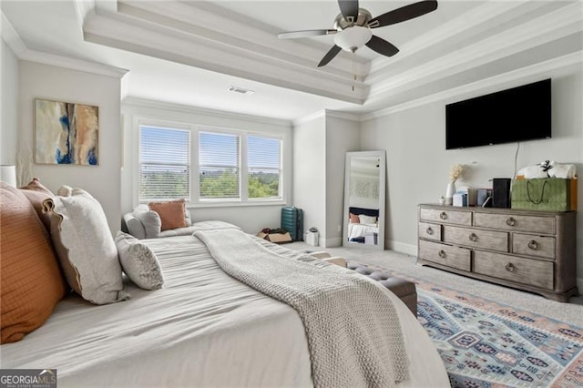 10 Nesbit Reserve Ct, Atlanta, GA 30350 - carpeted bedroom featuring a tray ceiling, crown molding, and a ceiling fan