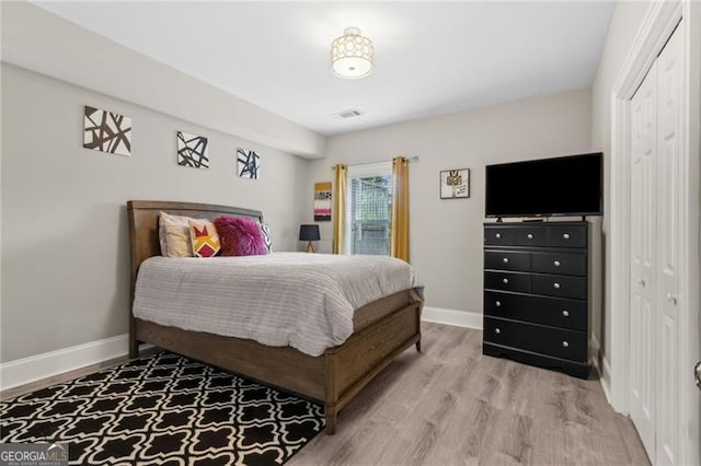10 Nesbit Reserve Ct, Atlanta, GA 30350 - bedroom with wood finished floors and a closet