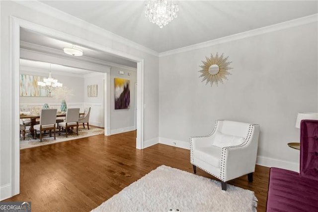 10 Nesbit Reserve Ct, Atlanta, GA 30350 - living area featuring a chandelier, crown molding, and wood finished floors