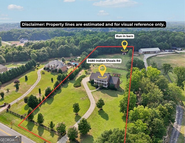 3480 Indian Shoals Rd, Dacula, GA 30019 - aerial view of property and surrounding area featuring property parcel outlined