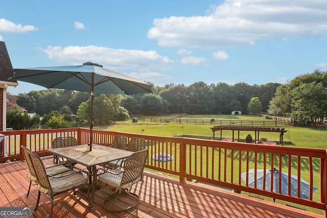 3480 Indian Shoals Rd, Dacula, GA 30019 - deck featuring outdoor dining space and a lawn